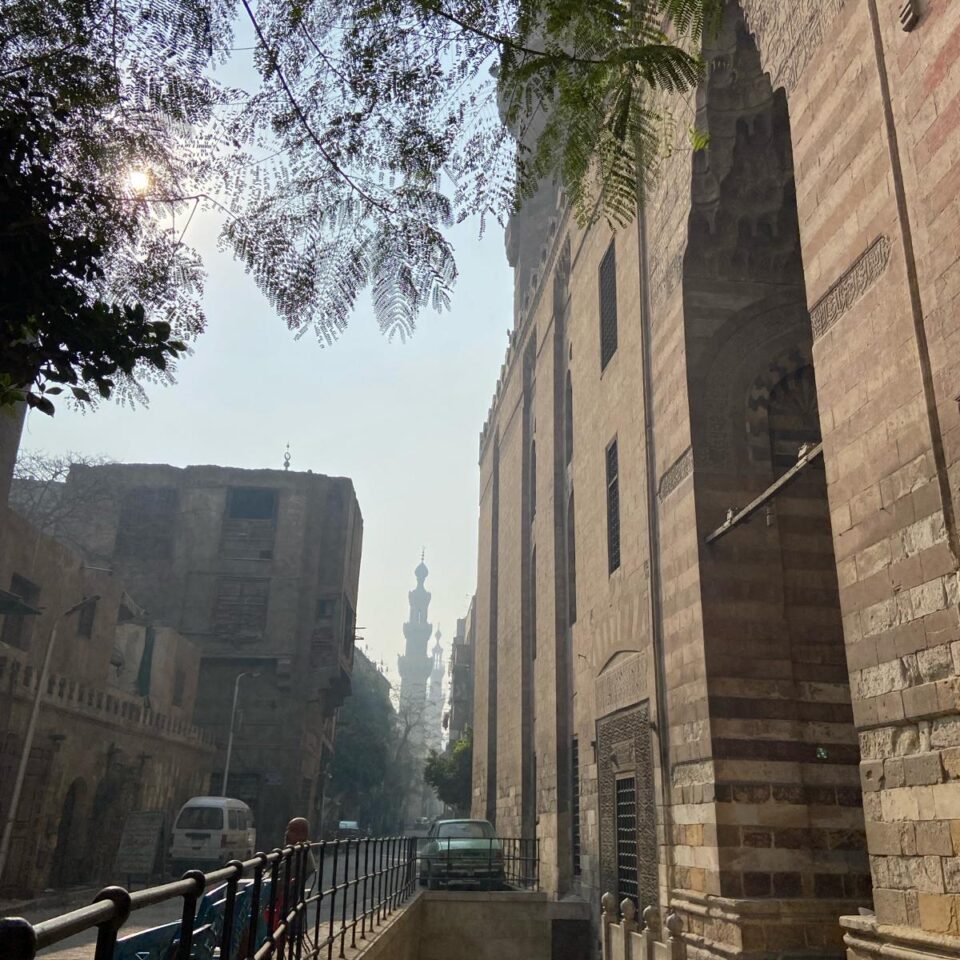 a street view of the facade of Bayt Al Razzaz in Cairo