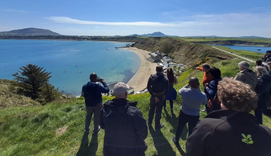 INTO project partners including Zanzibar Stone Town Heritage Society visiting Porthdinllaen in April 2023.