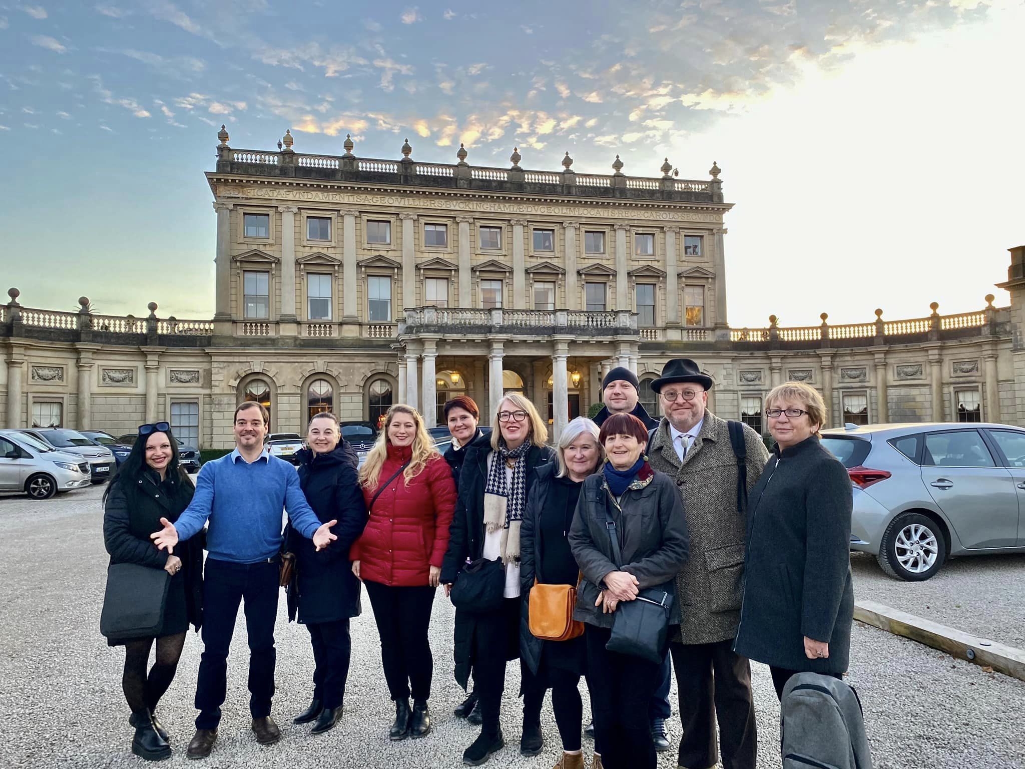 People in front of an old building